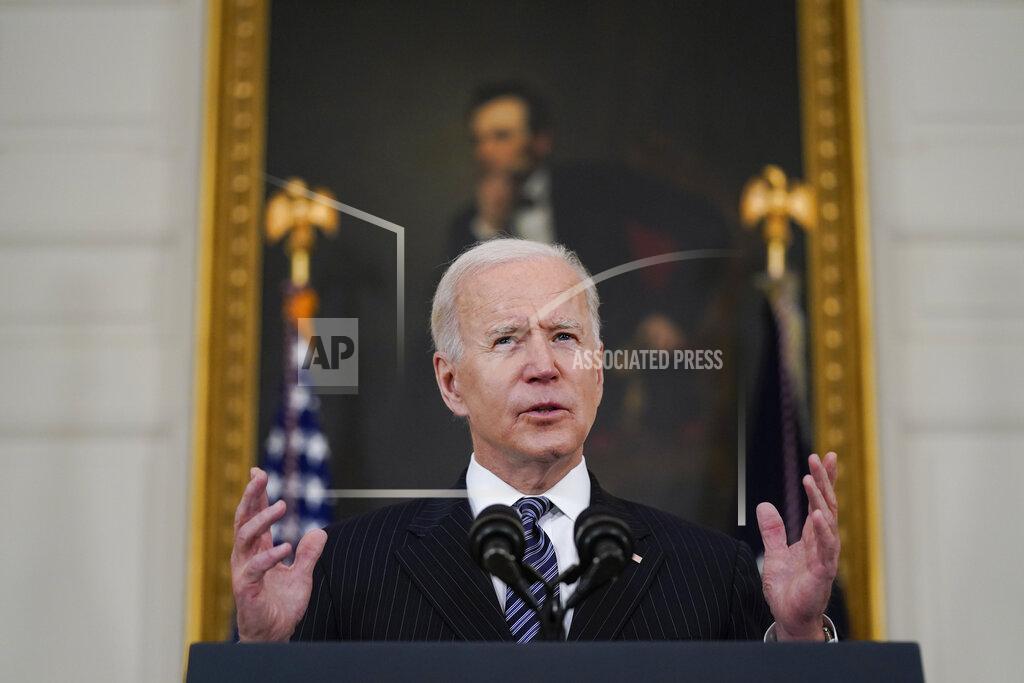 President Joe Biden delivers remarks about vaccinations, in the State Dining Room of the White House, Tuesday, April 6, 2021, in Washington. (AP Photo/Evan Vucci)