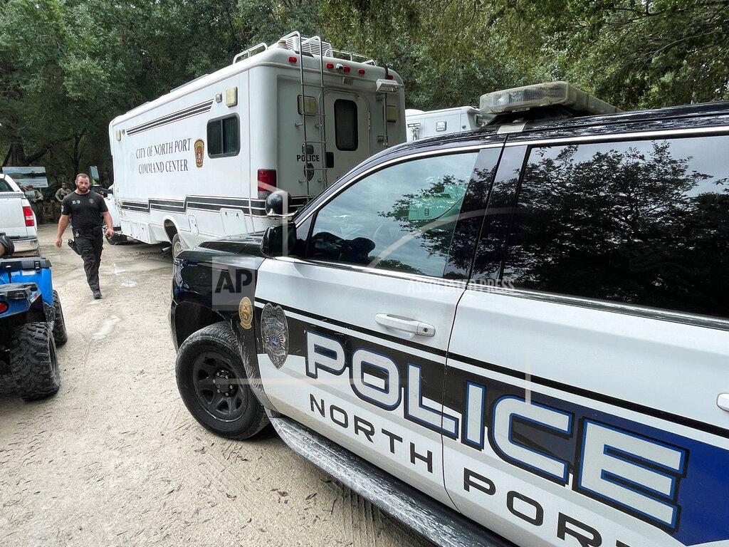 Uncredited In this photo provided by North Port Police Department, law enforcement officials conduct a search of the vast Carlton Reserve in the Sarasota, Fla., area for Brian Laundrie on Saturday, Sept. 18, 2021. Laundrie is a person of interest in the disappearance of his girlfriend, Gabrielle “Gabby” Petito. (North Port Police Department via AP)