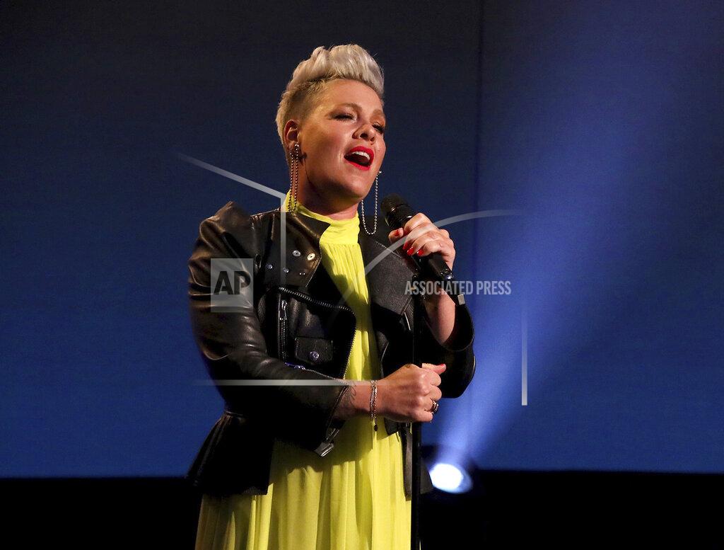 Michael Rozman In this photo released by Warner Bros., singer Pink performs during the final taping of "The Ellen DeGeneres Show" at the Warner Bros. lot in Burbank, Calif. (Michael Rozman/Warner Bros. via AP)