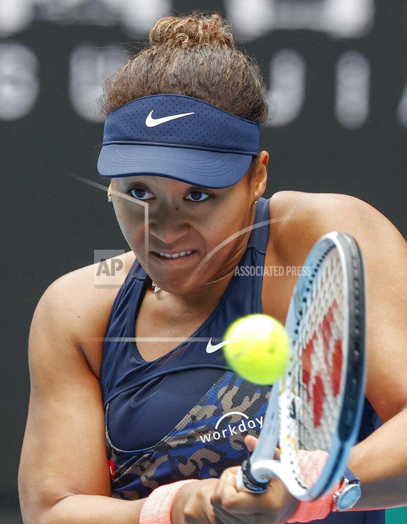 Rick Rycroft Japan's Naomi Osaka makes a backhand return to Russia's Anastasia Pavlyuchenkova during their first round match at the Australian Open tennis championship in Melbourne, Australia, Monday, Feb. 8, 2021.(AP Photo/Rick Rycroft)