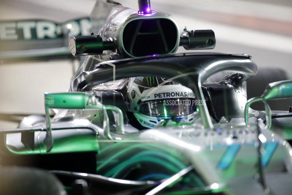 Luca Bruno Mercedes driver Valtteri Bottas of Finland steers his car during the second free practice at the Yas Marina racetrack in Abu Dhabi, United Arab Emirates, Friday Nov. 23, 2018. The Emirates Formula One Grand Prix will take place on Sunday. (AP Photo/Luca Bruno)