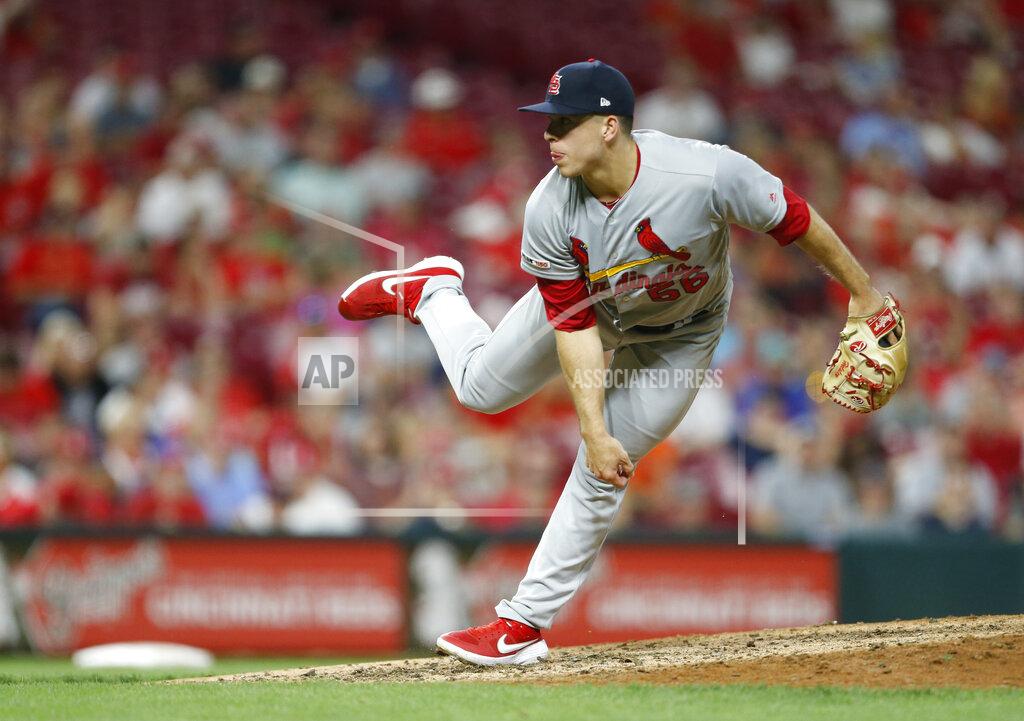 Gary Landers FILE - In this Aug. 15, 2019, file photo, St. Louis Cardinals relief pitcher Ryan Helsley throws against the Cincinnati Reds during the eighth inning of a baseball game in Cincinnati. Helsley was disappointed by his first exposure to the Atlanta Braves’ fans use of the Tomahawk Chop for their chants during games. Helsley’s vantage point is different than most players who visit SunTrust Park. He is a member of the Cherokee nation.
(AP Photo/Gary Landers, File)