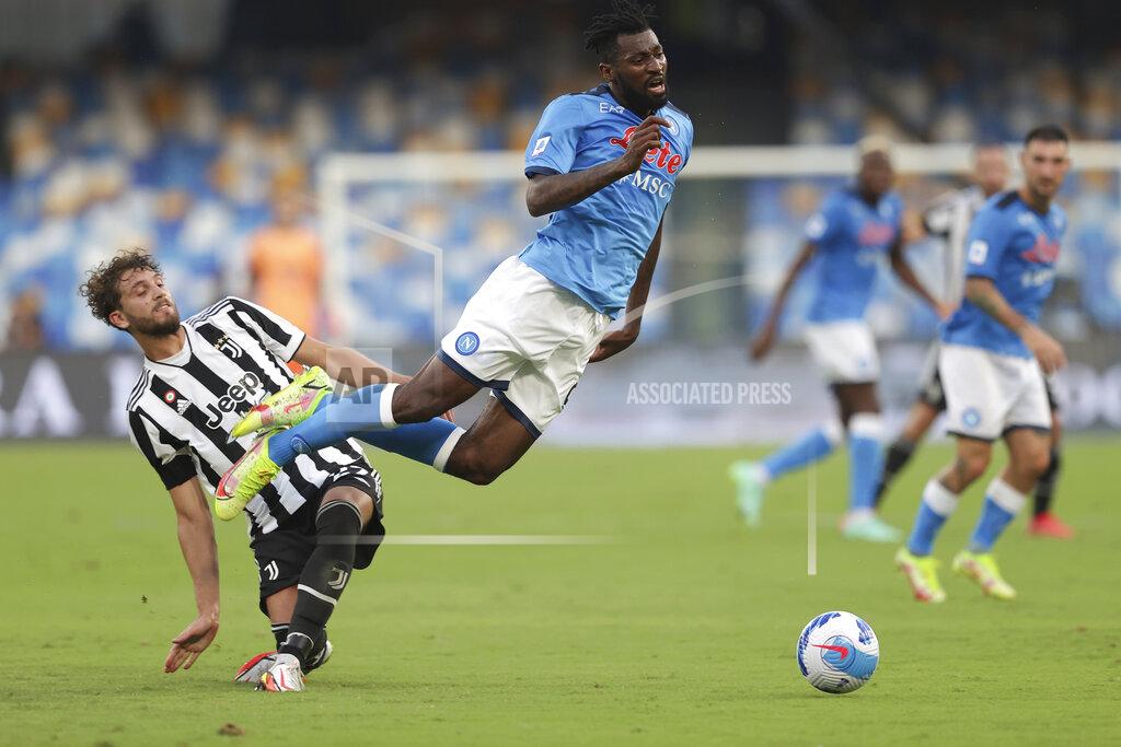 Alessandro Garofalo Juventus' Manuel Locatelli, left, and Napoli's Andre Frank Zambo Anguissa vie for the ball during the Italian Serie A soccer match between Napoli and Juventus at the Diego Maradona stadium in Naples, Italy, Saturday, Sept. 11, 2021. (Alessandro Garofalo/LaPresse via AP)