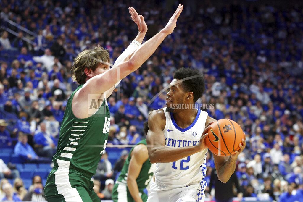 James Crisp Kentucky's Keion Brooks Jr. (12) is pressured Ohio's Ben Vander Plas (5) during the first half of an NCAA college basketball game in Lexington, Ky., Friday, Nov. 19, 2021. (AP Photo/James Crisp)