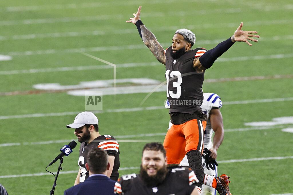 Ron Schwane Cleveland Browns wide receiver Odell Beckham Jr. (13) jumps behind Baker Mayfield after they defeated the Indianapolis Colts in an NFL football game, Sunday, Oct. 11, 2020, in Cleveland. (AP Photo/Ron Schwane)
