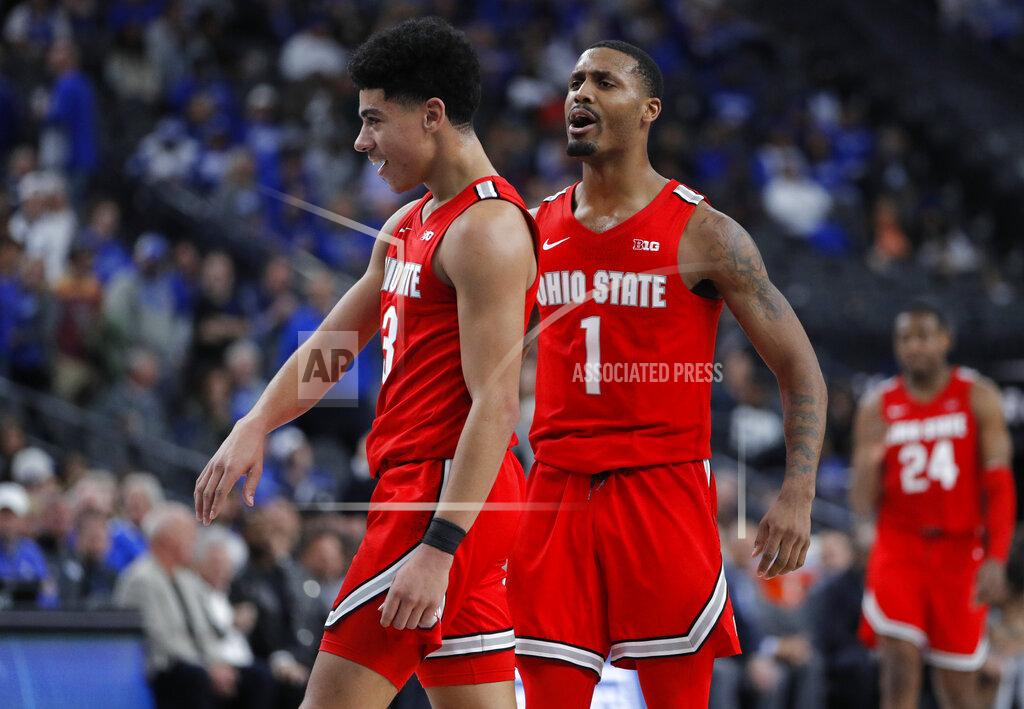 John Locher Ohio State's D.J. Carton, left, and Luther Muhammad celebrate as they lead against Kentucky during the second half of an NCAA college basketball game Saturday, Dec. 21, 2019, in Las Vegas. (AP Photo/John Locher)