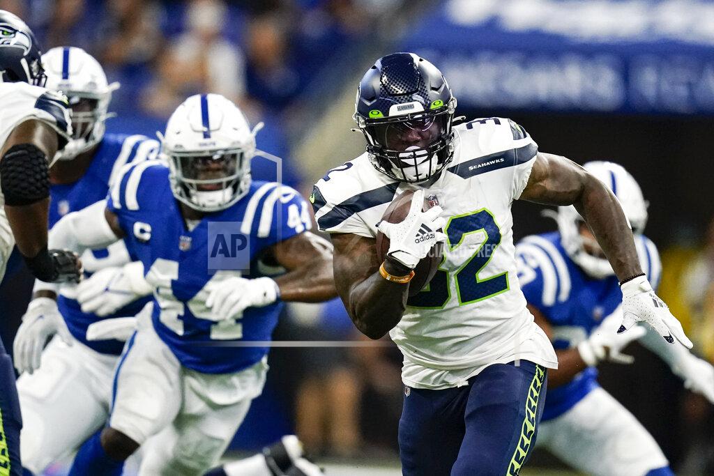 Charlie Neibergall Seattle Seahawks running back Chris Carson (32) runs against the Indianapolis Colts in the first half of an NFL football game in Indianapolis, Sunday, Sept. 12, 2021. (AP Photo/Charlie Neibergall)