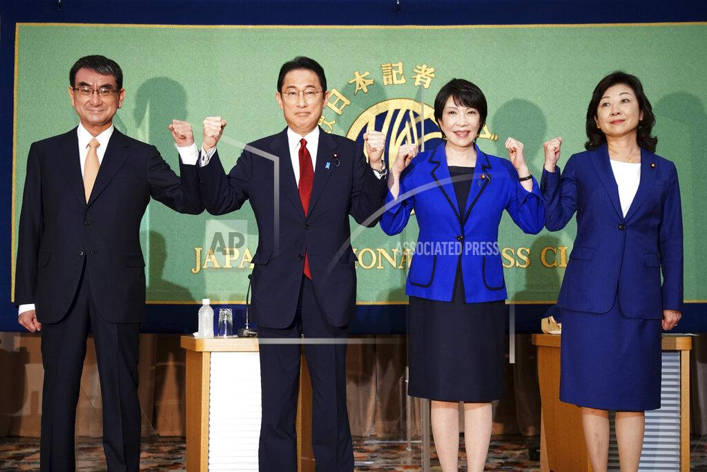 Eugene Hoshiko FILE - In this Sept. 18, 2021, file photo, Candidates for the presidential election of the ruling Liberal Democratic Party pose for photographers prior to a debate session held by Japan National Press club in Tokyo. The contenders are, from left to right, Taro Kono, the cabinet minister in charge of vaccinations, Fumio Kishida, former foreign minister, Sanae Takaichi, former internal affairs minister, and Seiko Noda, former internal affairs minister. The inclusion of two women among the four candidates vying to become the next prime minister seems like a big step forward for Japan's notoriously sexist politics. (AP Photo/Eugene Hoshiko, File)