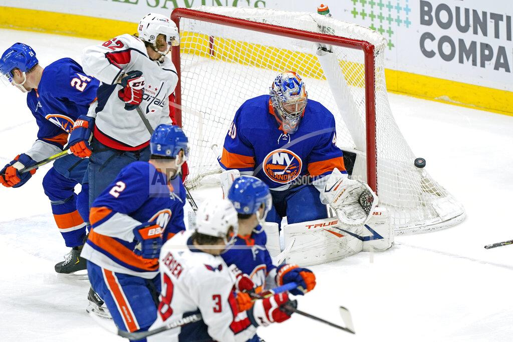Kathy Willens New York Islanders goaltender Semyon Varlamov (40) makes a save against the Washington Capitals during the second period of an NHL hockey game, Thursday, April 22, 2021, in Uniondale, N.Y. (AP Photo/Kathy Willens)