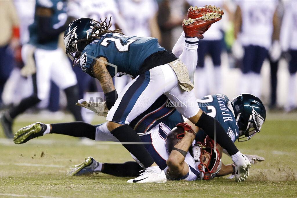 Michael Perez New England Patriots' Julian Edelman (11) is tackled by Philadelphia Eagles' Rodney McLeod (23) and Avonte Maddox (29) during the first half of an NFL football game, Sunday, Nov. 17, 2019, in Philadelphia. (AP Photo/Michael Perez)