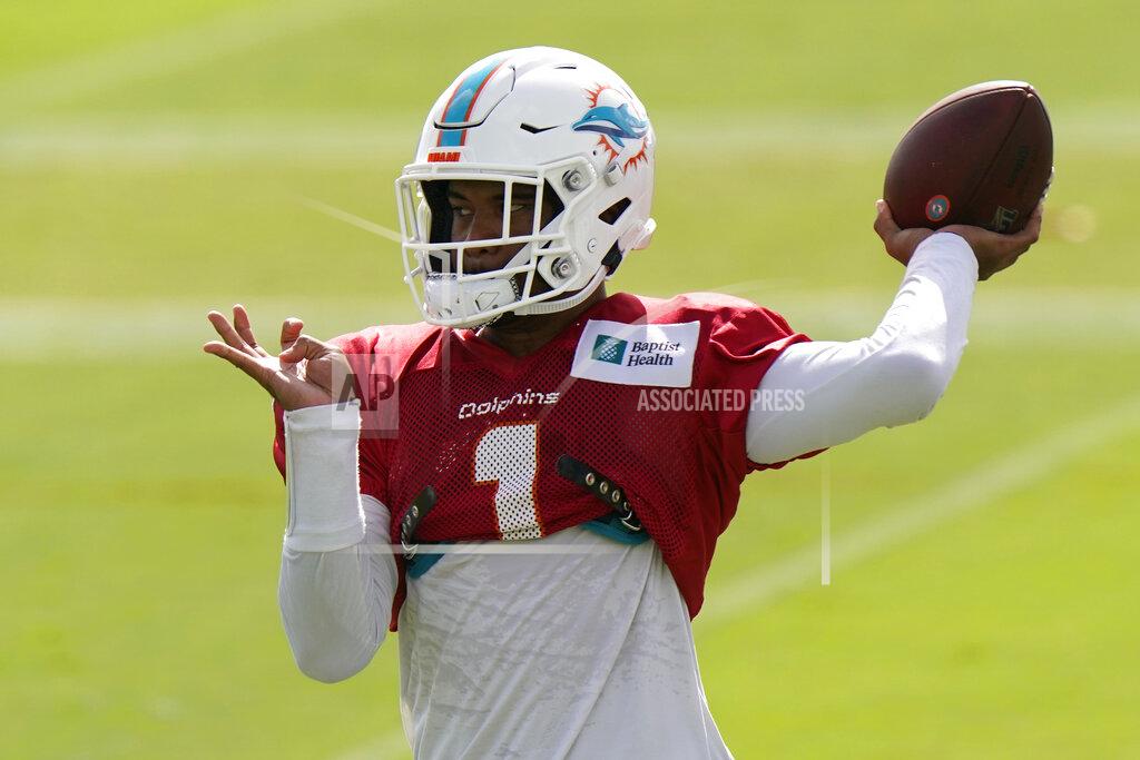 Lynne Sladky Miami Dolphins quarterback Tua Tagovailoa (1) does drills during practice at the NFL football team's training facility, Tuesday, Aug. 25, 2020, in Davie, Fla. (AP Photo/Lynne Sladky)