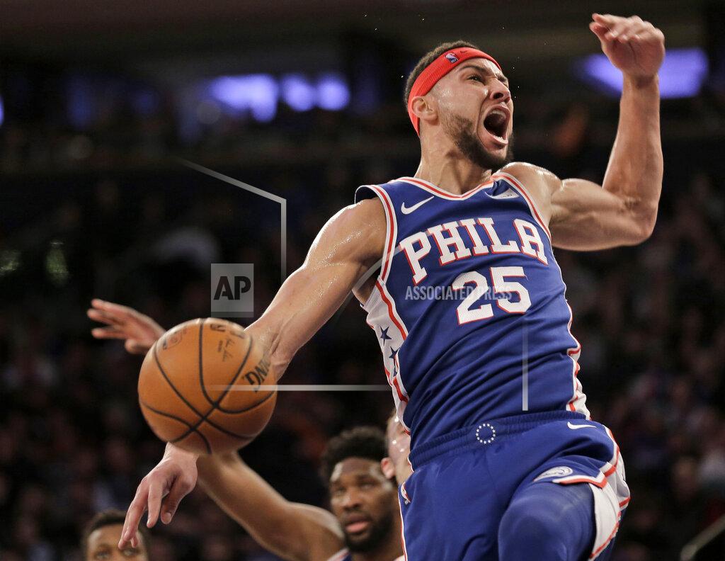 Seth Wenig Philadelphia 76ers' Ben Simmons reacts after dunking during the first half of an NBA basketball game against the New York Knicks, Sunday, Jan. 13, 2019, in New York. (AP Photo/Seth Wenig)