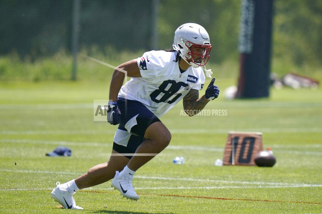 Steven Senne New England Patriots tight end Devin Asiasi (86) runs a drill during NFL football practice in Foxborough, Mass., Thursday, May 27, 2021. (AP Photo/Steven Senne)