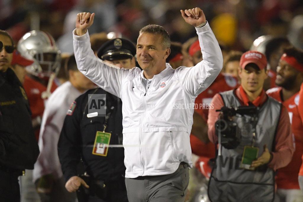 Mark J. Terrill FILE - In this Tuesday, Jan. 1, 2019 file photo, Ohio State coach Urban Meyer celebrates at the end of the team's 28-23 win over Washington during the Rose Bowl NCAA college football game in Pasadena, Calif. Ohio State says the August investigation that led to a three-game suspension of football coach Urban Meyer cost the university $1 million, twice the amount originally requested for it. A school spokesman said Thursday, Jan. 3, 2019 that the initial $500,000 amount was preliminary and didn’t reflect the whole anticipated cost. (AP Photo/Mark J. Terrill, File)