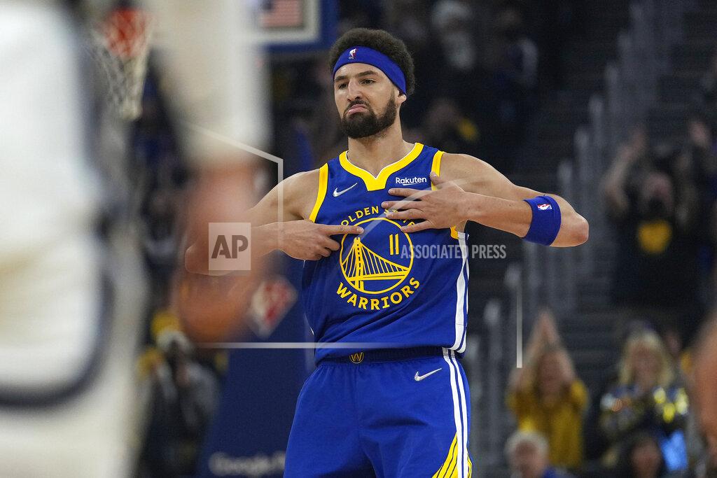 Tony Avelar Golden State Warriors guard Klay Thompson (11) reacts after making a 3-point shot against the Memphis Grizzlies during the first half of Game 6 of an NBA basketball Western Conference playoff semifinal in San Francisco, Friday, May 13, 2022. (AP Photo/Tony Avelar)