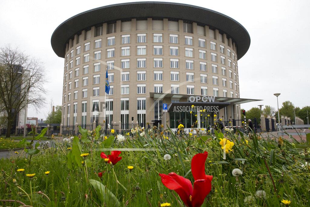 -FILE- In this Friday, April 21, 2017, image the headquarters of the Organisation for the Prohibition of Chemical Weapons, OPCW, are seen in The Hague, Netherlands. Russia came under renewed pressure to explain the nerve agent attack on opposition figure Alexei Navalny as the annual meeting of the global chemical weapons watchdog got underway Monday Nov. 30, 2020, amid measures aimed at reining in the spread of the coronavirus. (AP Photo/Peter Dejong)