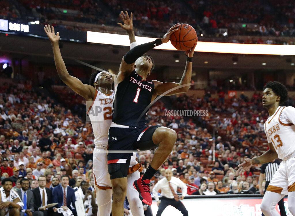 Eric Gay Texas Tech guard Terrence Shannon Jr. (1) drives to the basket past Texas forward Kai Jones (22) during the first half of an NCAA college basketball game, Saturday, Feb. 8, 2020, in Austin, Texas. (AP Photo/Eric Gay)