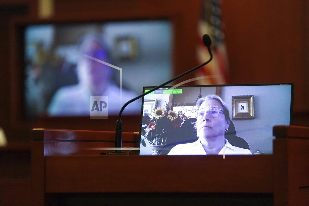 Shaw Thew Disney Executive Tina Newman testifies in a previously recorded video deposition at the Fairfax County Circuit Courthouse in Fairfax, Va., Thursday, May 19, 2022. Actor Johnny Depp sued his ex-wife Amber Heard for libel in Fairfax County Circuit Court after she wrote an op-ed piece in The Washington Post in 2018 referring to herself as a "public figure representing domestic abuse." (Shawn Thew/Pool Photo via AP)