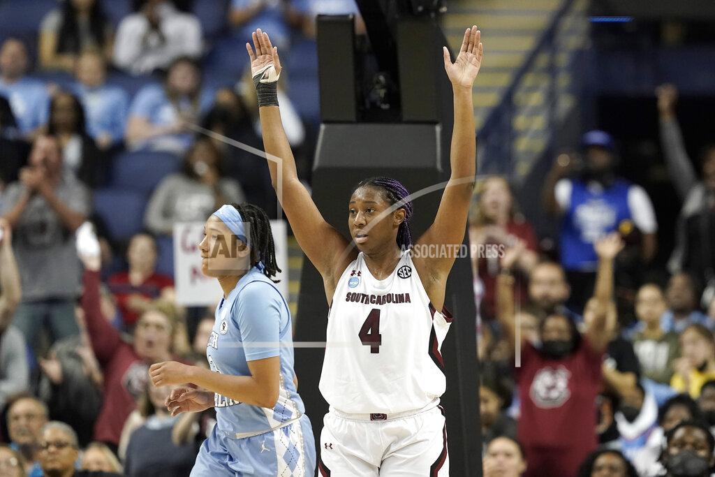 Gerry Broome South Carolina forward Aliyah Boston (4) reacts while North Carolina guard Kennedy Todd-Williams, left, looks away following a college basketball game in the Sweet 16 round of the NCAA tournament in Greensboro, N.C., Friday, March 25, 2022. (AP Photo/Gerry Broome)