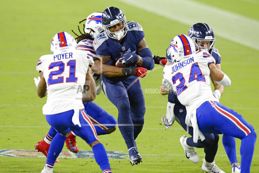 Mark Zaleski Tennessee Titans tight end Jonnu Smith (81) is stopped by Buffalo Bills middle linebacker Tremaine Edmunds (49) in the first half of an NFL football game Tuesday, Oct. 13, 2020, in Nashville, Tenn. (AP Photo/Mark Zaleski)