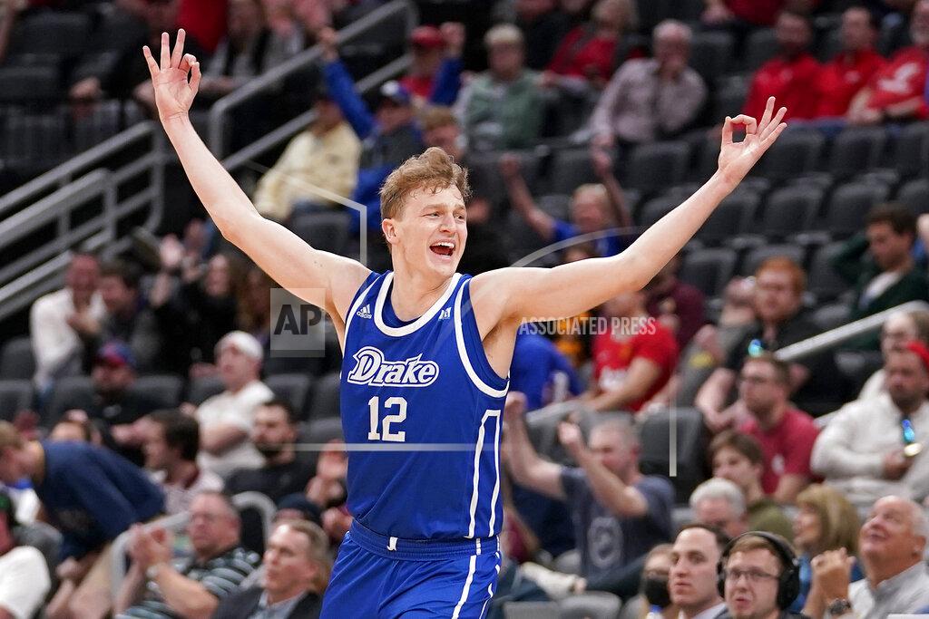 Jeff Roberson Drake's Tucker Devries celebrates after making a 3-point basket during overtime of an NCAA college basketball game against Missouri State in the semifinal round of the Missouri Valley Conference tournament Saturday, March 5, 2022, in St. Louis. Drake won 79-78. (AP Photo/Jeff Roberson)