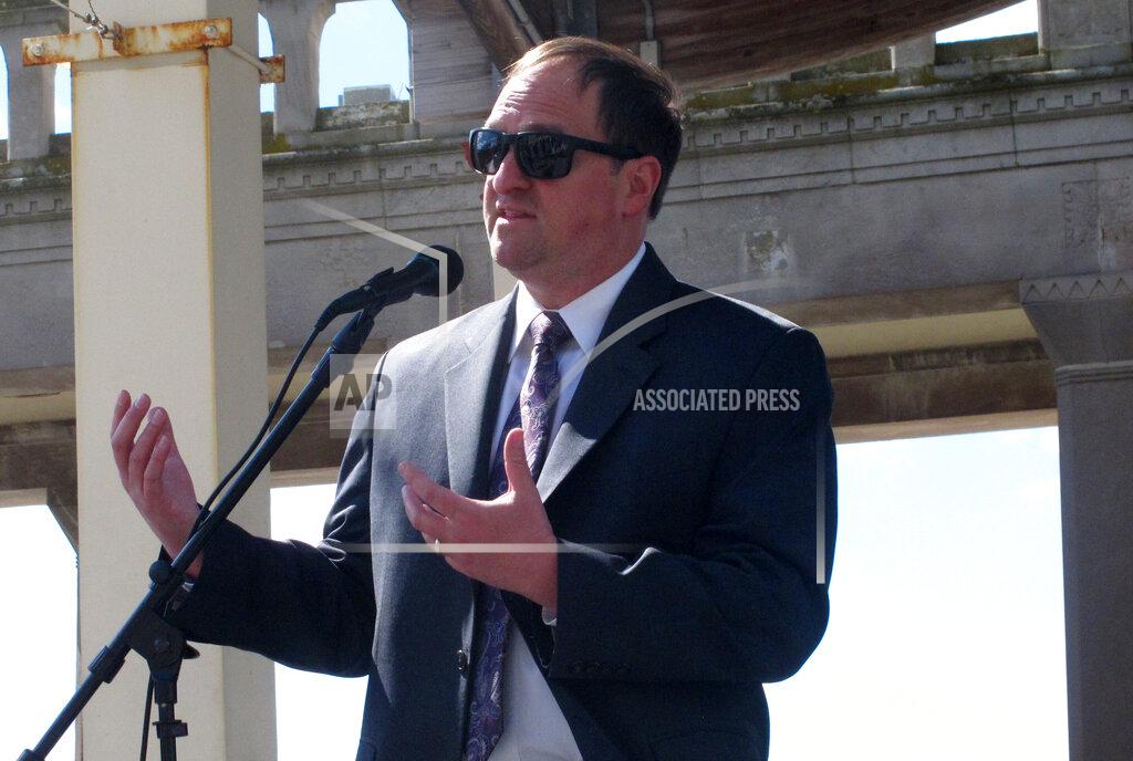 Wayne Parry Michael Chait, president of the Greater Atlantic City Chamber of Commerce, speaks at a news conference on the Atlantic City, N.J. Boardwalk on Friday, April 30, 2021. Chait and other business and political officials called on Gov. Phil Murphy to ease coronavirus restrictions enough to allow conventions and trade shows to resume in Atlantic City. (AP Photo/Wayne Parry)