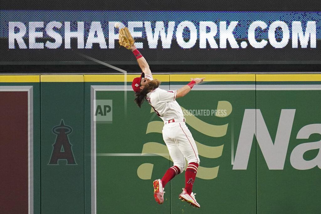 Ashley Landis Los Angeles Angels center fielder Brandon Marsh (16) can't reach a sharp line drive hit by Texas Rangers' Nick Solak during the fourth inning of a baseball game Friday, Sep. 3, 2021, in Anaheim, Calif. Solak doubled. (AP Photo/Ashley Landis)