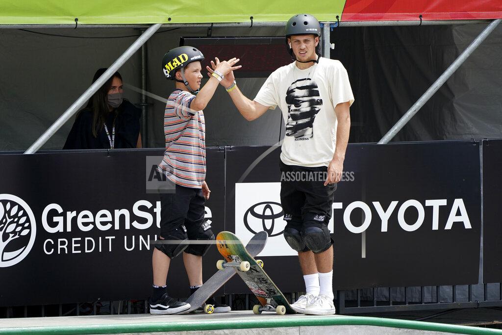 Charlie Neibergall Hampus Winberg, of Sweden, talks with Yam Behar, of Israel, right, during practice at an Olympic qualifying skateboarding event at Lauridsen Skatepark, Wednesday, May 19, 2021, in Des Moines, Iowa. The questions under the magnifying glass at this week's Dew Tour — one of the last major qualifying events for the games in Tokyo in July — is whether the Olympics is ready for skateboarding and, more tellingly, whether skateboarding is ready for the Olympics. (AP Photo/Charlie Neibergall)