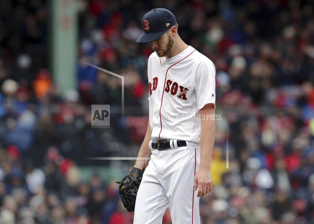 Charles Krupa Boston Red Sox starting pitcher Chris Sale walks off the mound after the top of the fourth inning of the home opener baseball game against the Toronto Blue Jays, Tuesday, April 9, 2019, in Boston. (AP Photo/Charles Krupa)