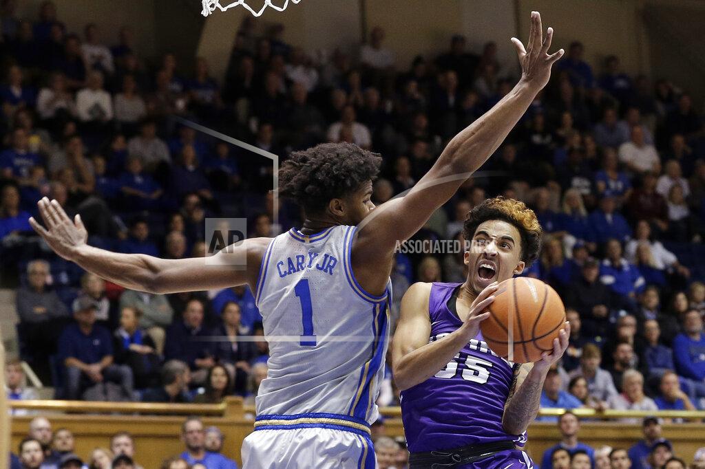 Gerry Broome Duke center Vernon Carey Jr. (1) guards Central Arkansas guard DeAndre Jones (55) during the half of an NCAA college basketball game in Durham, N.C., Tuesday, Nov. 12, 2019. (AP Photo/Gerry Broome)