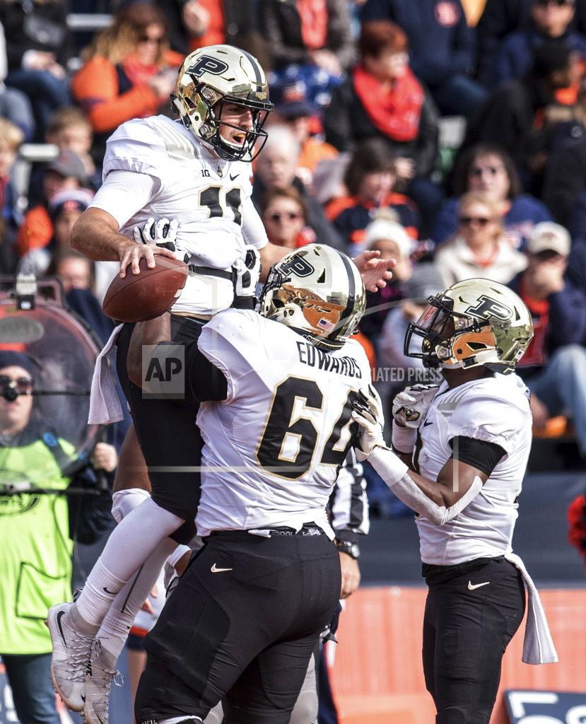 Holly Hart FILE - In this Saturday, Oct. 13, 2018, file photo, Purdue quarterback David Blough celebrates his touchdown catch with teammates during the first half of an NCAA college football game against Illinois in Champaign, Ill. Blough has played the finest football of his career since replacing the injured Elijah Sindelar and the defense has started coming around, too. (AP Photo/Holly Hart, File)
