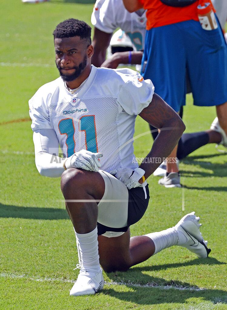 Joel Auerbach Miami Dolphins wide receiver DeVante Parker (11) stretches during NFL football practice in Davie, Fla., Friday, Sept. 11, 2020. (AP Photo/Joel Auerbach)