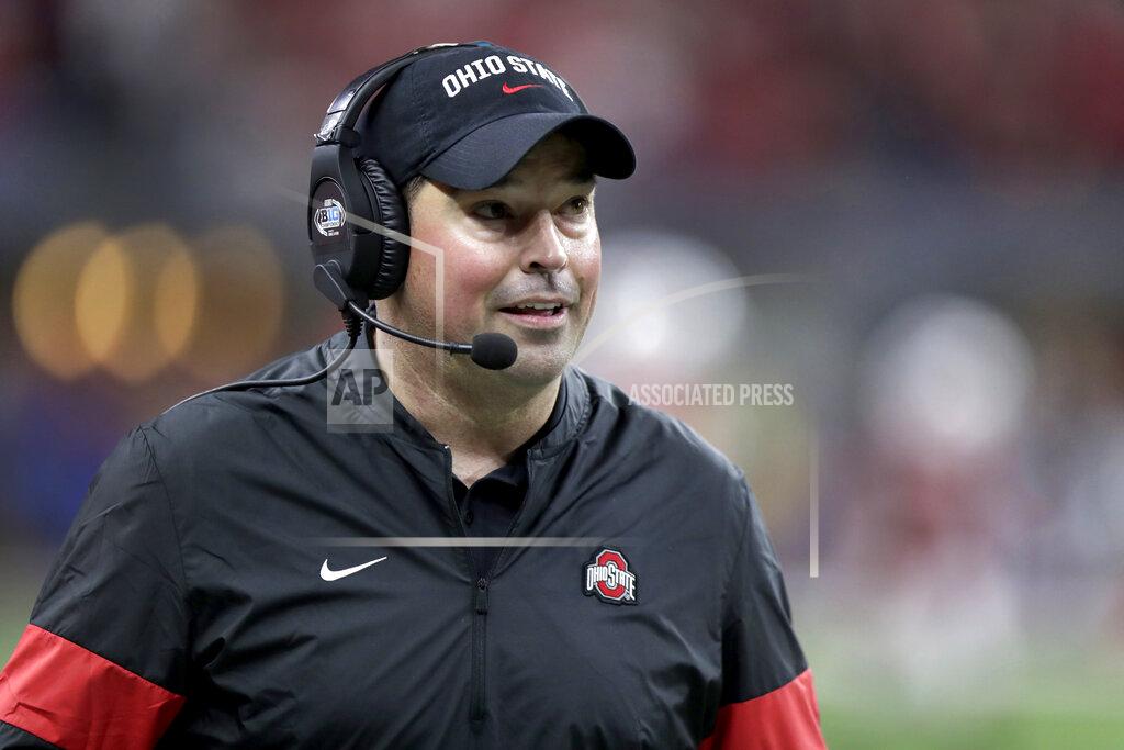 Michael Conroy FILE - In this Dec. 7, 2019, file photo, Ohio State coach Ryan Day watches during the second half of the team's Big Ten championship NCAA college football game against Wisconsin in Indianapolis. Ohio State opens preseason training camp on Thursday, Aug. 6, 2020, with strict coronavirus protocols in place and under a cloud of uncertainty about whether a revised 10-game season will even be played at all. (AP Photo/Michael Conroy, File)