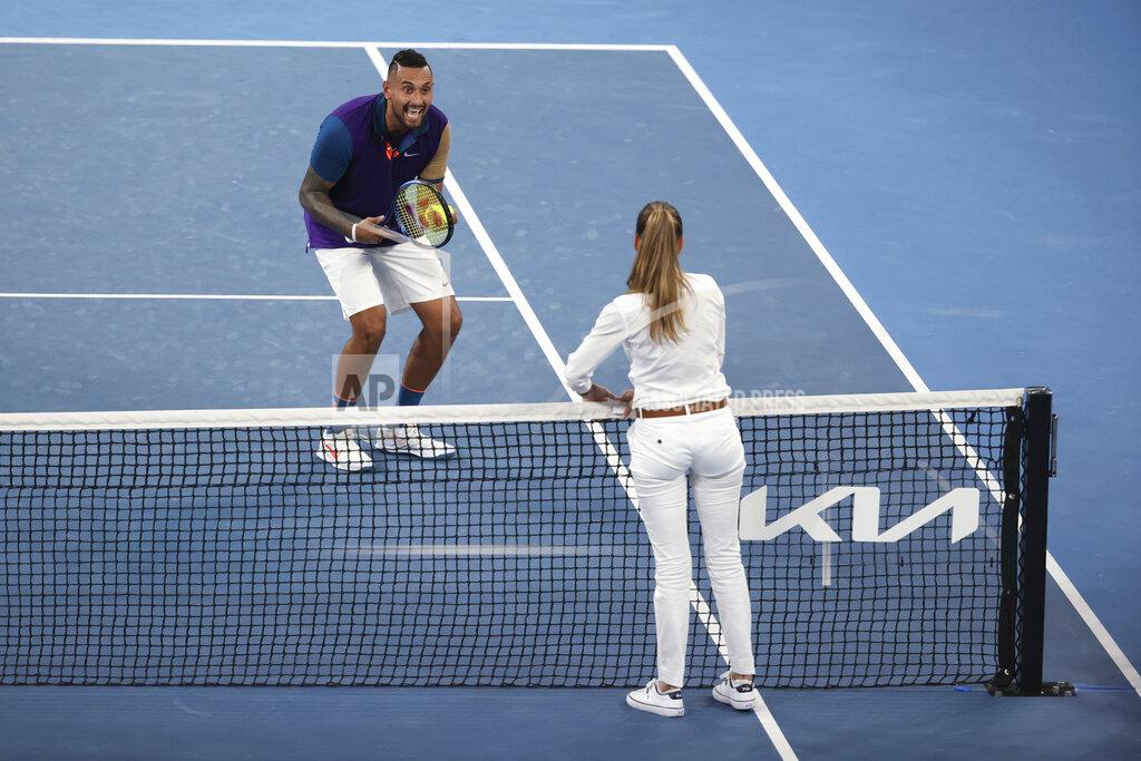 Hamish Blair Australia's Nick Kyrgios reacts as he speaks with umpire Marijana Veljovic regarding the net during his match against France's Ugo Humbert during their second round match at the Australian Open tennis championship in Melbourne, Australia, Wednesday, Feb. 10, 2021. (AP Photo/Hamish Blair)