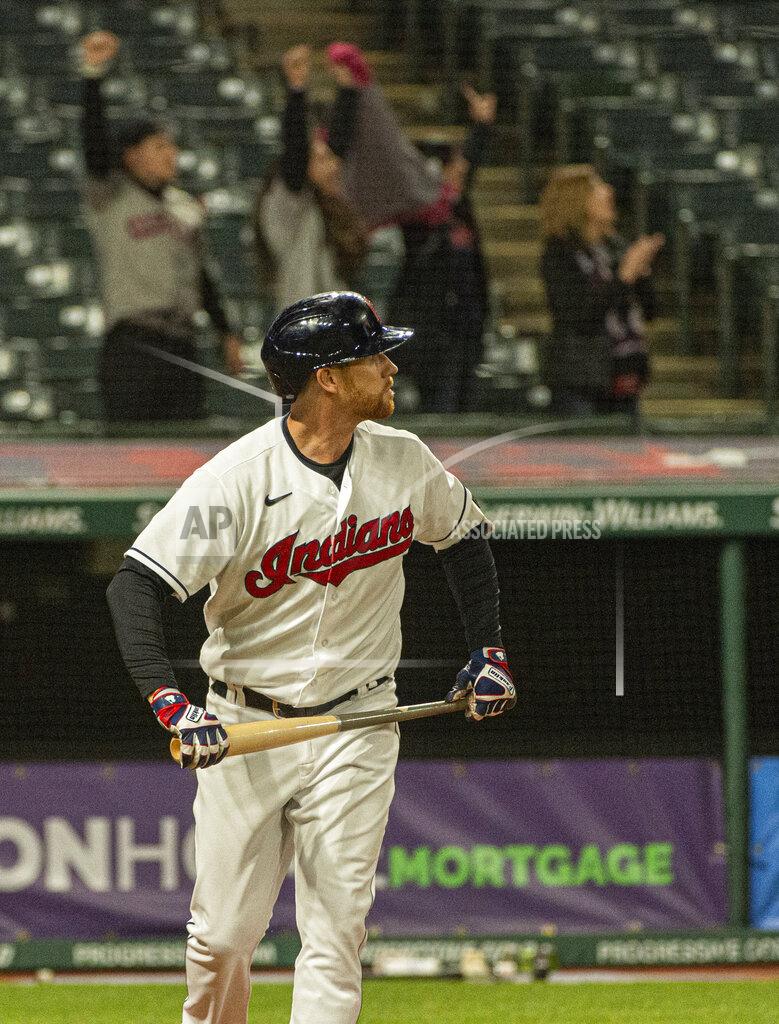 Phil Long Cleveland Indians' Jordan Luplow watches his game-winning two-run home run off Minnesota Twins relief pitcher Alex Colome during the tenth inning of a baseball game in Cleveland, Monday, April 26, 2021. (AP Photo/Phil Long)