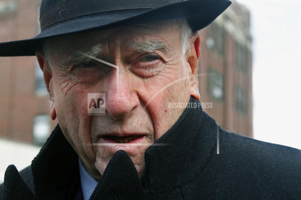 FILE - In this March 4, 2011 file photo, federal Judge Jack Weinstein speaks with reporters after visiting the Louis Armstrong housing projects in Bedford-Stuyvesant section of Brooklyn, New York. Weinstein, who was nominated by President Lyndon Johnson and who contributed to the landmark case that struck down racial segregation in public schools is retiring at age 98. (AP Photo/Bebeto Matthews, File)