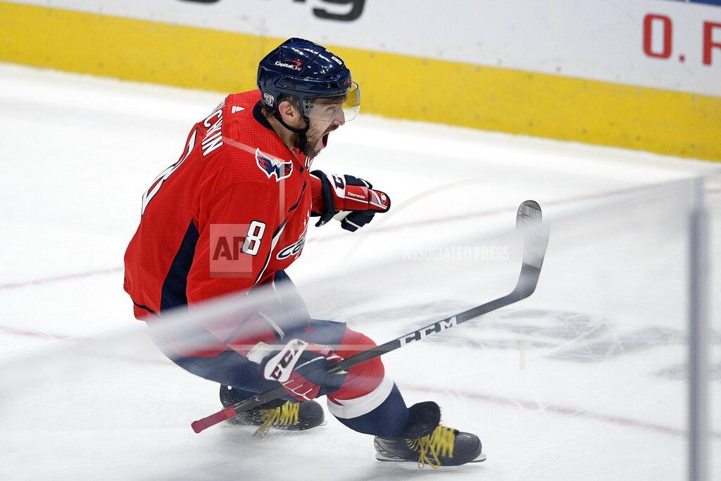 Nick Wass Washington Capitals left wing Alex Ovechkin (8), of Russia, celebrates his game-winning goal in overtime of an NHL hockey game against the Boston Bruins, Saturday, Jan. 30, 2021, in Washington. The Capitals won 4-3 in overtime. (AP Photo/Nick Wass)