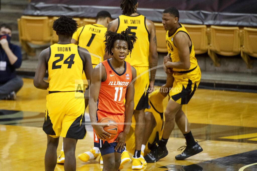 L.g. Patterson Illinois's Ayo Dosunmu, center, reacts after an offensive foul was called on him during the second half of an NCAA college basketball game against Missouri, Saturday, Dec. 12, 2020, in Columbia, Mo. (AP Photo/L.G. Patterson)