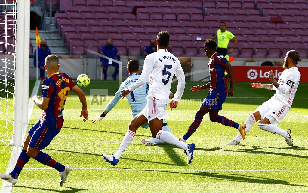 Joan Monfort Barcelona's Ansu Fati scores his side's first goal during the Spanish La Liga soccer match between FC Barcelona and Real Madrid at the Camp Nou stadium in Barcelona, Spain, Saturday, Oct. 24, 2020. (AP Photo/Joan Monfort)
