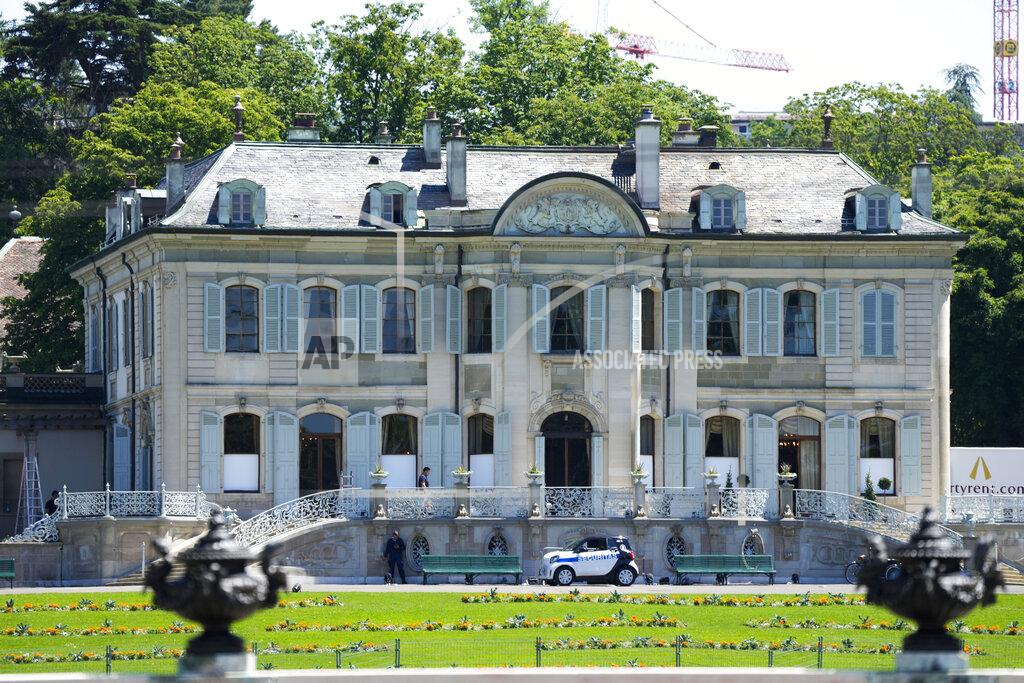 Markus Schreiber Security car stands in front of the 'Villa la Grange' in Geneva, Switzerland Monday, June 14, 2021. The 'Villa La Grange' is the venue for the meeting between US President Joe Biden and Russian President Vladimir Putin in Geneva, scheduled for Wednesday, June 16, 2021. (AP Photo/Markus Schreiber)
