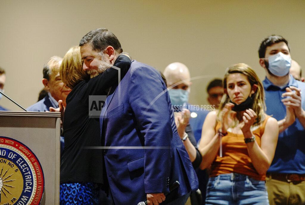 Andrew Rush Pittsburgh Mayor Bill Peduto hugs his sister-in-law Donna Peduto after giving his concession speech at his election party Tuesday, May 18, 2021, in Pittsburgh. Peduto lost in the Democratic primary to state Rep. Ed Gainey. (Andrew Rush/Pittsburgh Post-Gazette via AP)