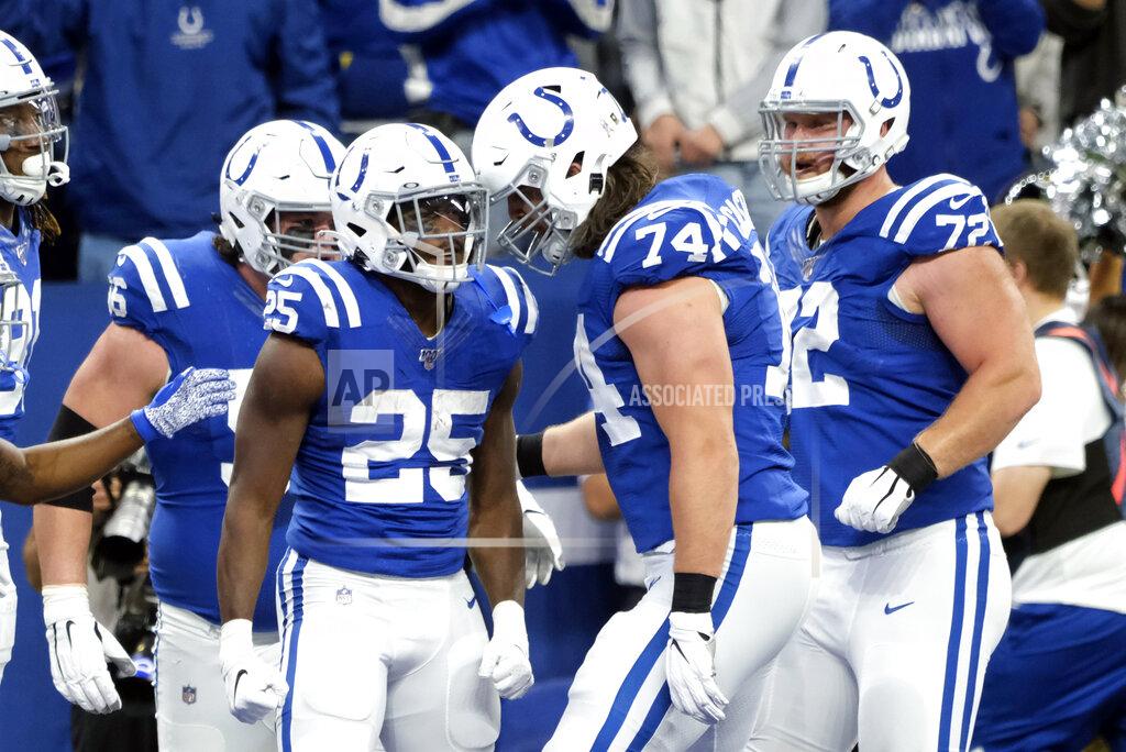 Aj Mast Indianapolis Colts running back Marlon Mack (25) celebrates his touchdown run with offensive tackle Anthony Castonzo (74) during the first half of an NFL football game against the Jacksonville Jaguars, Sunday, Nov. 17, 2019, in Indianapolis. (AP Photo/AJ Mast)