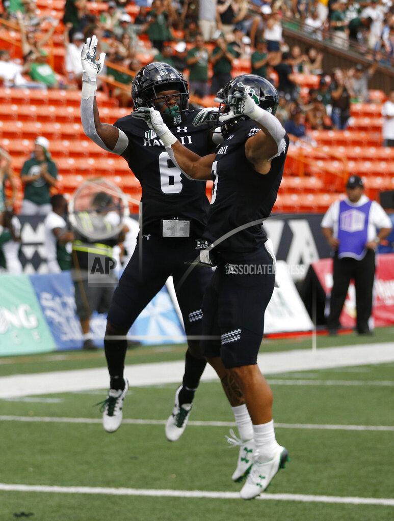 Marco Garcia Hawaii wide receiver Cedric Byrd II (6) and wide receiver Jason-Matthew Sharsh (3) celebrate a firs-quarter touchdown against Arizona during an NCAA college football game Saturday, Aug. 24, 2019, in Honolulu. (AP Photo/Marco Garcia)