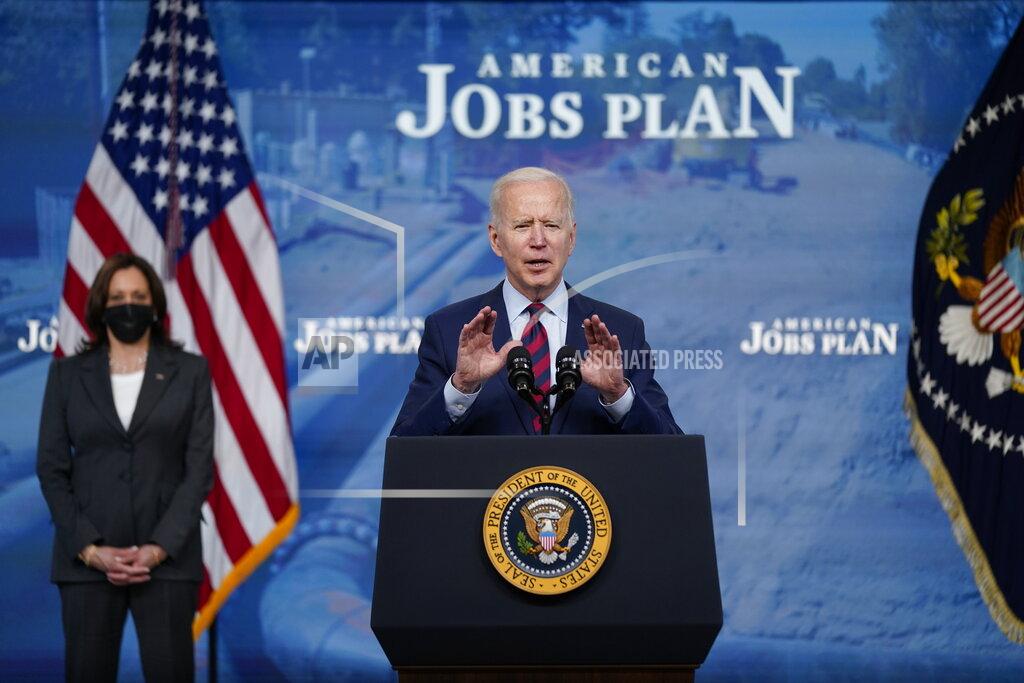 Evan Vucci President Joe Biden speaks during an event on the American Jobs Plan in the South Court Auditorium on the White House campus, Wednesday, April 7, 2021, in Washington. Vice President Kamala Harris is at left. (AP Photo/Evan Vucci)