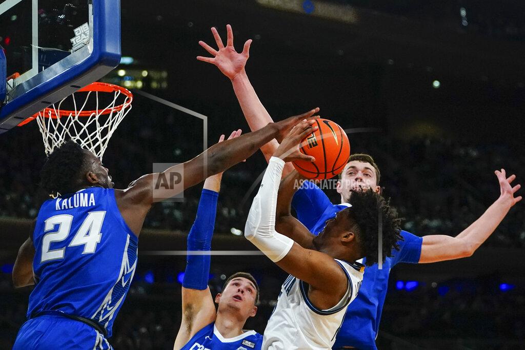Frank Franklin Ii Creighton's Arthur Kaluma, left, blocks a shot by Villanova's Jordan Longino, front right, as Creighton's Ryan Kalkbrenner, right, defends during the first half of an NCAA college basketball game in the final of the Big East conference tournament Saturday, March 12, 2022, in New York. (AP Photo/Frank Franklin II)
