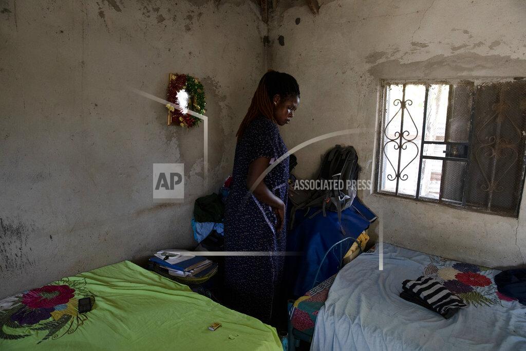 Adrienne Surprenant Paska Itwari Beda, the young mother of five children, prepares her husband's family reunion at their Juba, South Sudan home, Saturday, May 29, 2021. Even before the pandemic hit, South Sudanese women were accustomed to building lives on the edge of uncertainty. But COVID-19 is shaking that fragile foundation. The country is just a decade old and one of the world's most difficult places to raise children. (AP Photo/Adrienne Surprenant)