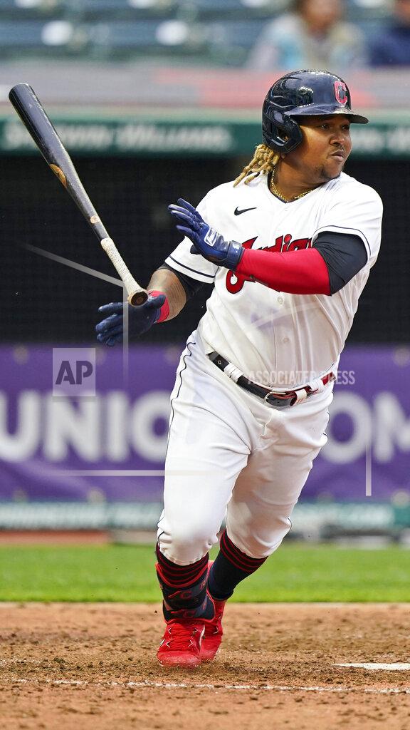 Tony Dejak Cleveland Indians' Jose Ramirez watches his ball after hitting a single in the ninth inning of a baseball game against the Kansas City Royals, Monday, April 5, 2021, in Cleveland. (AP Photo/Tony Dejak)