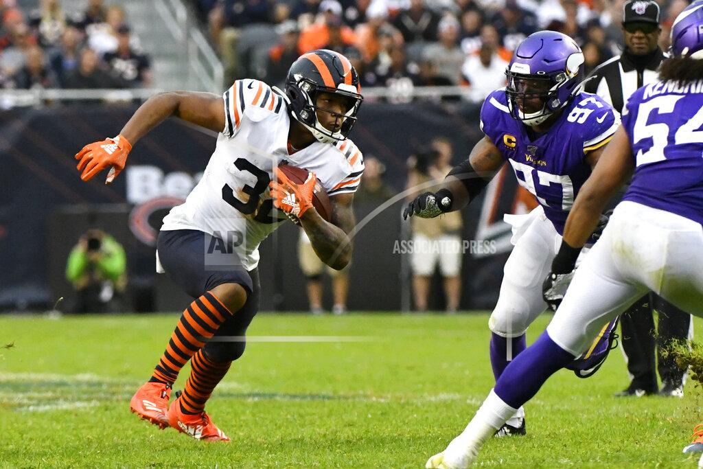 Matt Marton Chicago Bears running back David Montgomery (32) runs with the ball as Minnesota Vikings defensive end Everson Griffen (97) defends during the second half of an NFL football game Sunday, Sept. 29, 2019, in Chicago. (AP Photo/Matt Marton)