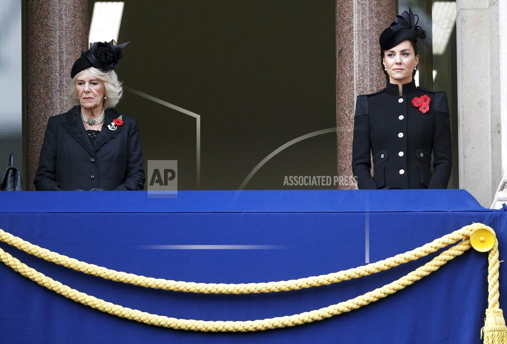Peter Nicholls Britain's Camilla, the Duchess of Cornwall and Kate, the Duchess of Cambridge watche from the balcony of the Foreign Office, during the Remembrance Sunday service at the Cenotaph, in Whitehall, London, Sunday Nov. 8, 2020. (Peter Nicholls/Pool Photo via AP)