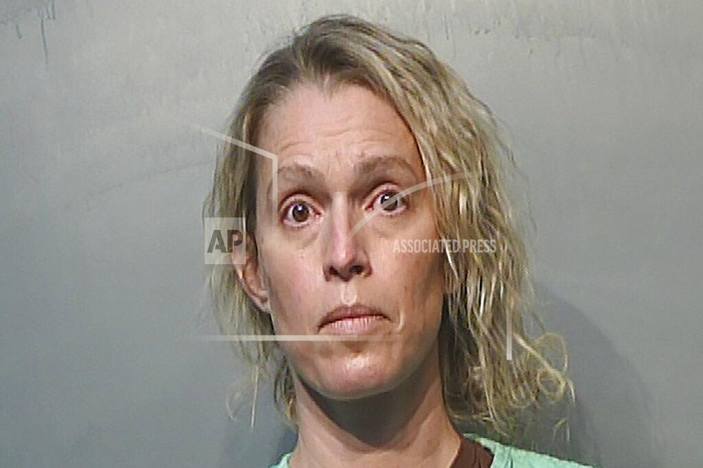 Uncredited This Jan. 21, 2021, photo provided by the Polk County Jail in Des Moines, Iowa shows Jennifer Woodley. Former Make-A-Wish Iowa CEO Jennifer Woodley is charged with first-degree theft and unauthorized use of a credit card. The organization announced last summer that she had been terminated as CEO after it discovered financial irregularities during a compliance review. (Polk County Jail via AP)